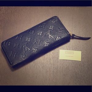 Louis Vuitton Clemence Empreinte Leather Wallet